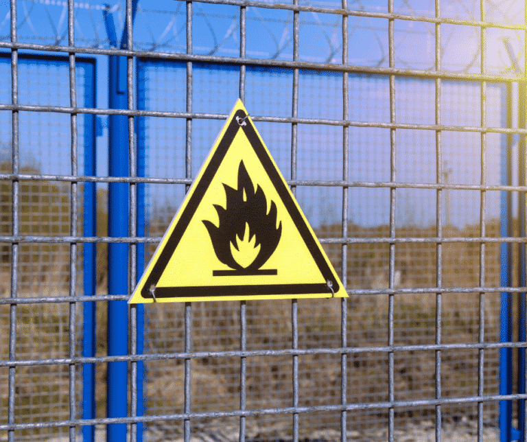 Fire Danger is Unusually High Right Now fire warning sign on fence