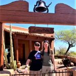 monika and doug standing in front of new house