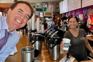 Luxury real estate agent Darrell Doepke getting a cappuccino form The Grotto.